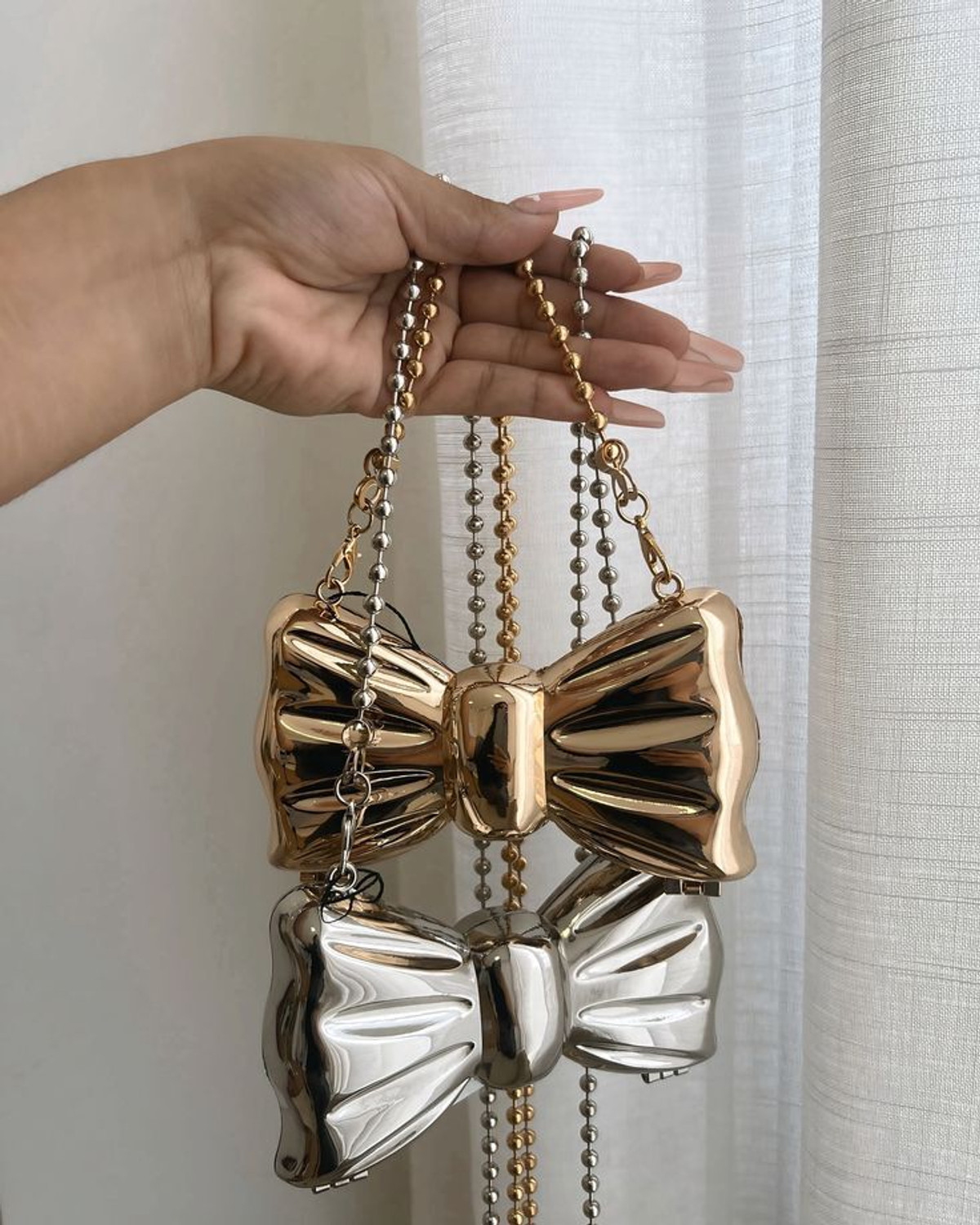 Image of THE SASSY BAE STUDIO Gold Clutch BOW SHAPED GOLD MINI CLUTCH-METALIC SLING FOR WOMEN