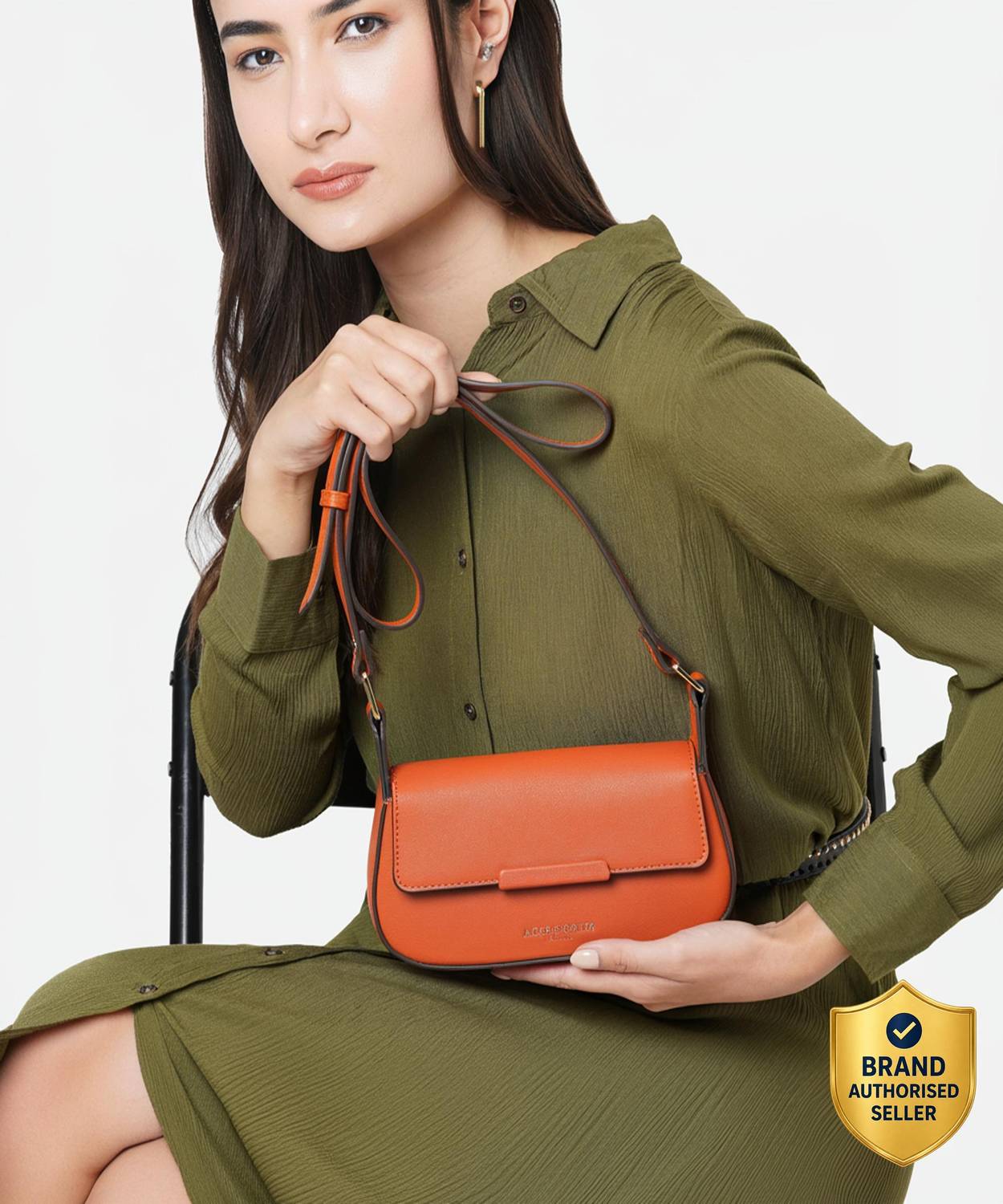ACCESSORIZE LONDON Orange Sling Bag Women's Orange Faux Leather Small Saddle Sling Bag