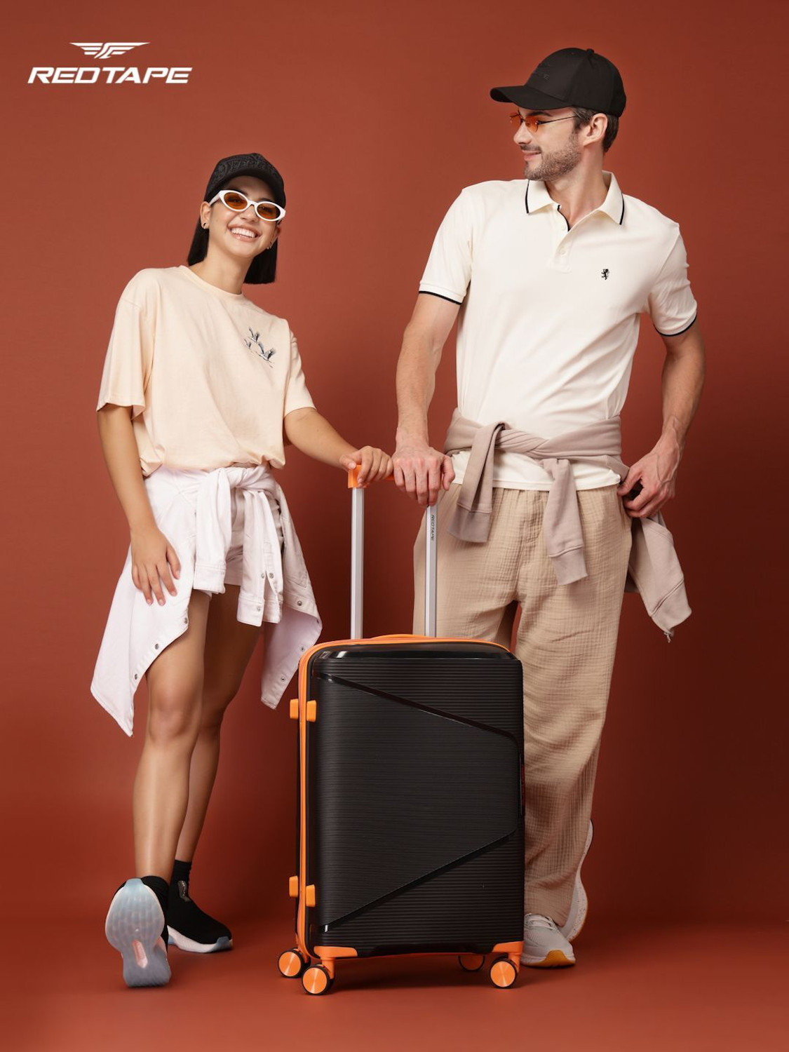 Image of Red Tape Unisex 60L Polypropylene Hard Trolley Bag With Mobile Holder Check-in Suitcase 8 Wheels - 24 inch