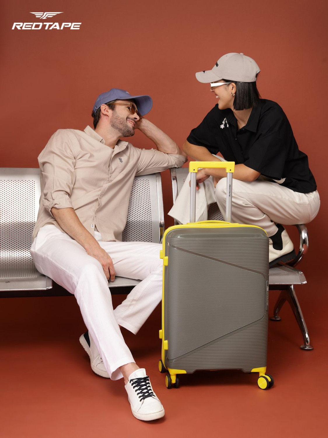 Image of Red Tape Unisex 60L Polypropylene Hard Trolley Bag With Mobile Holder Check-in Suitcase 8 Wheels - 24 inch