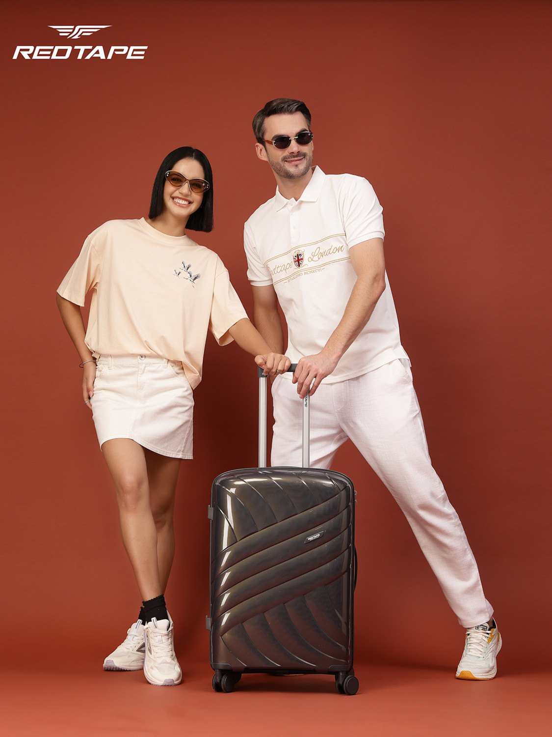 Image of Red Tape Unisex 60L Polycarbonate Hard Medium Check-in Trolley Bag (66 cm) Check-in Suitcase 8 Wheels - 24 inch