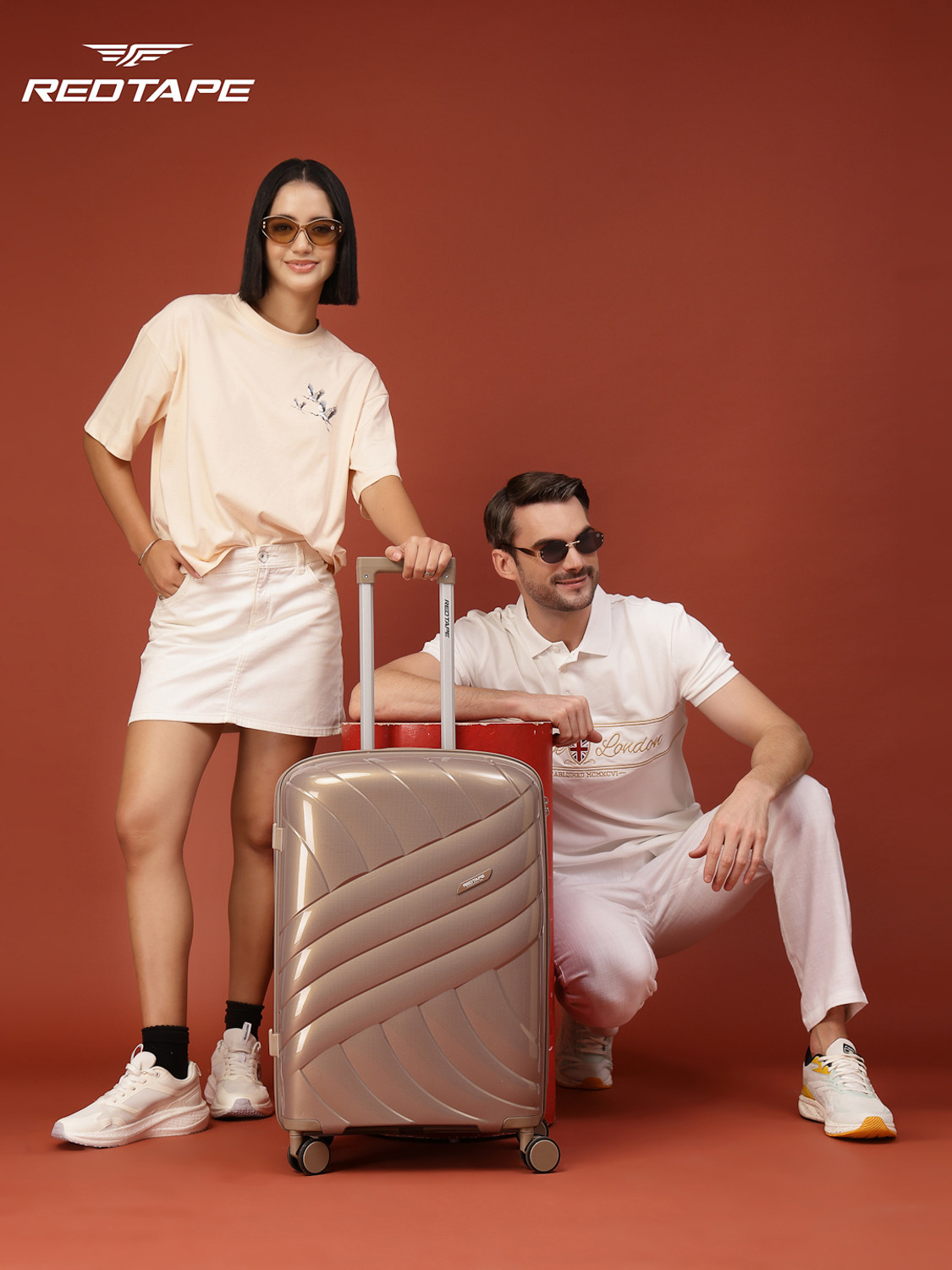 Image of Red Tape Unisex 60L Polycarbonate Hard Medium Check-in Trolley Bag (66 cm) Check-in Suitcase 8 Wheels - 24 inch