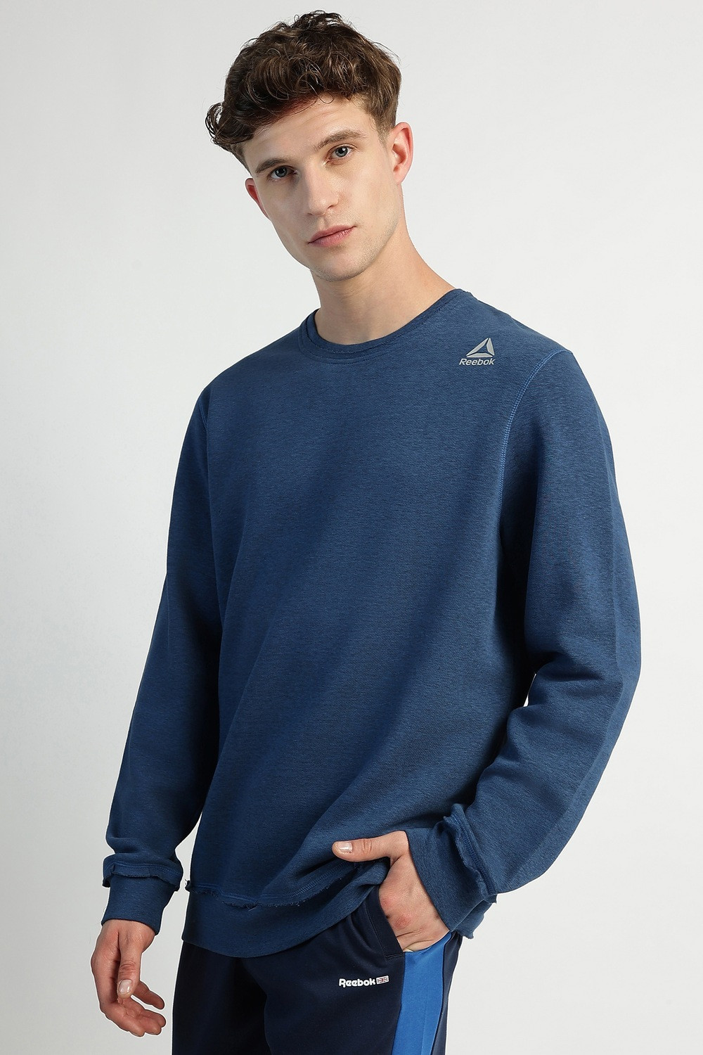 Image of REEBOK Men Full Sleeve Solid Sweatshirt
