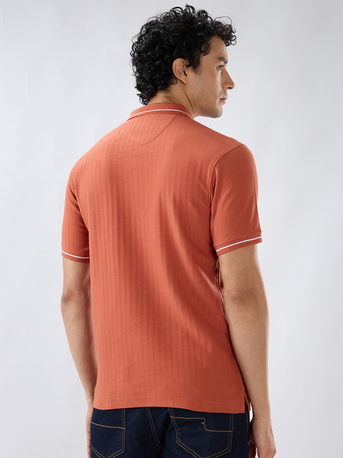 Image of Raymond Solid Men Polo Neck Orange T-Shirt