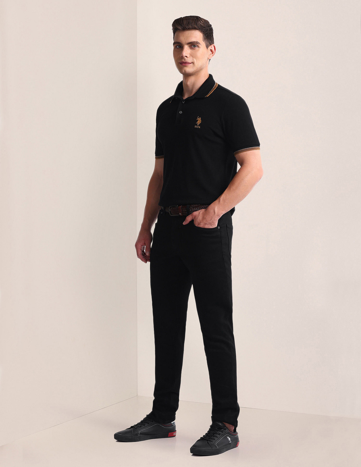 Image of U.S. POLO ASSN. Solid Men Polo Neck Black T-Shirt