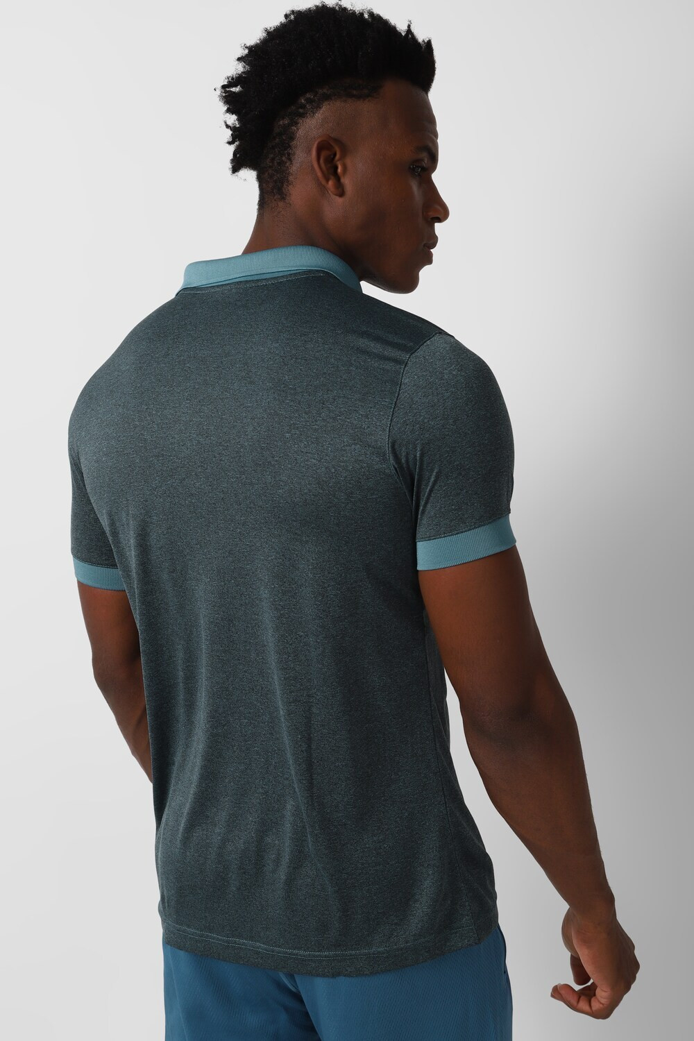 Image of REEBOK Printed Men Polo Neck Blue T-Shirt
