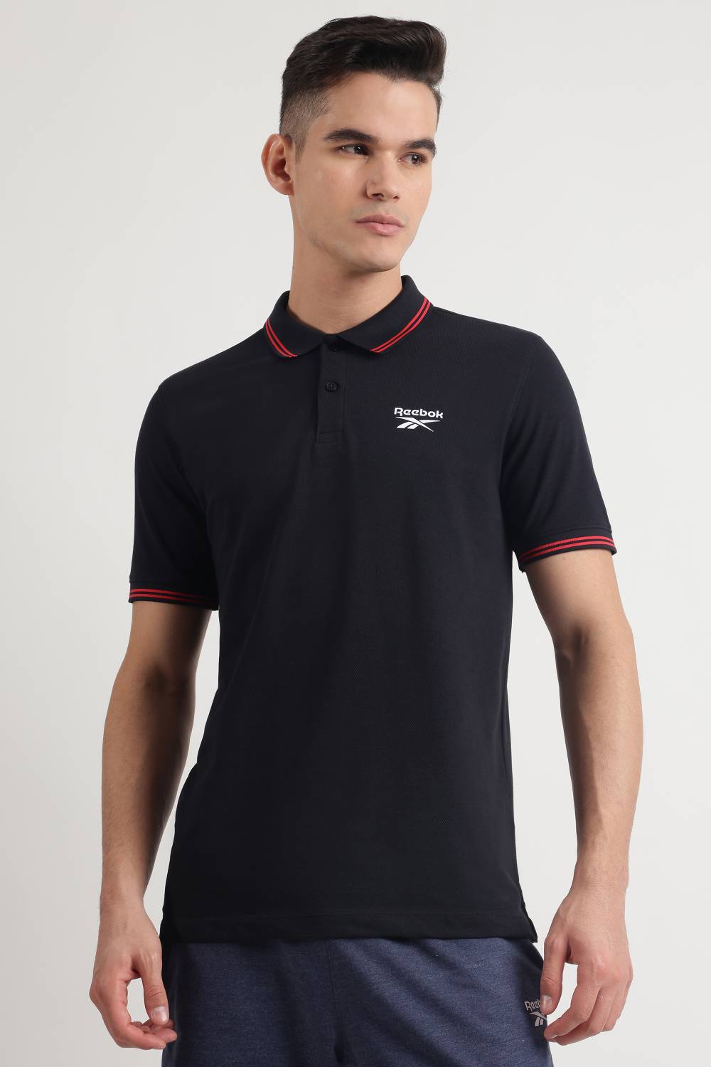 REEBOK Men Solid Polo Neck Cotton Blend Black T-Shirt