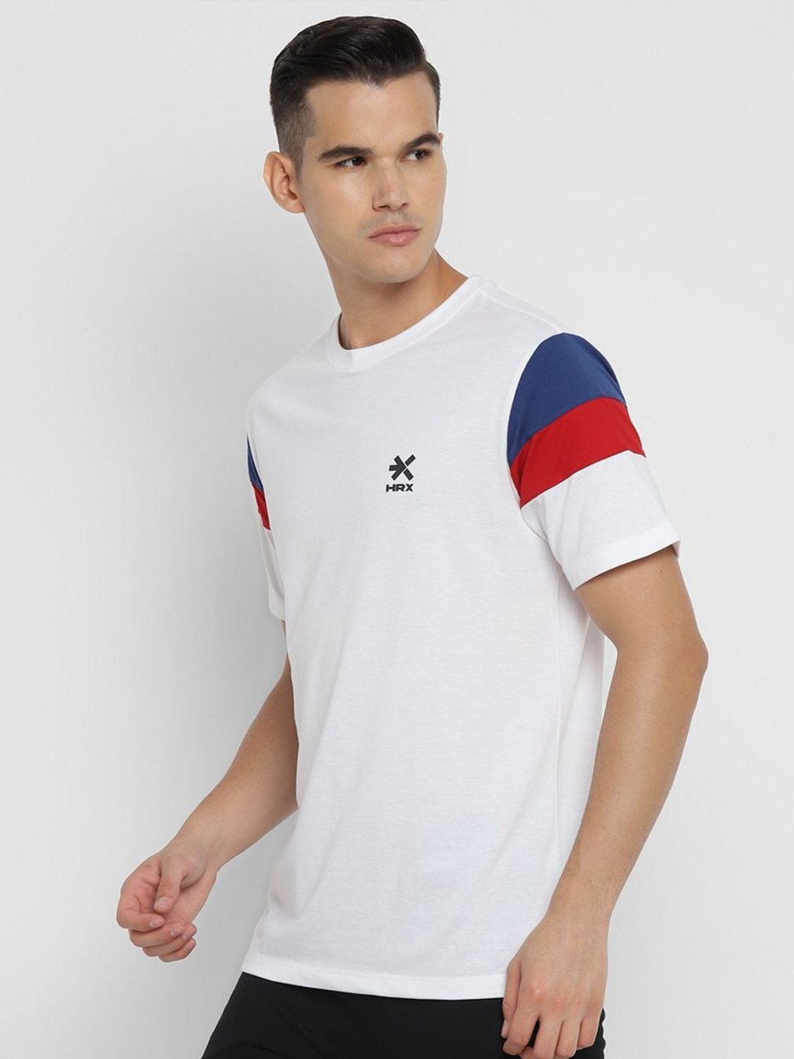 Image of HRX by Hrithik Roshan Solid Men Round Neck White T-Shirt