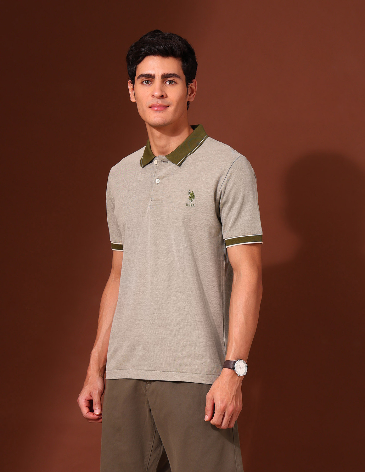 Image of U.S. POLO ASSN. Solid Men Polo Neck Green T-Shirt