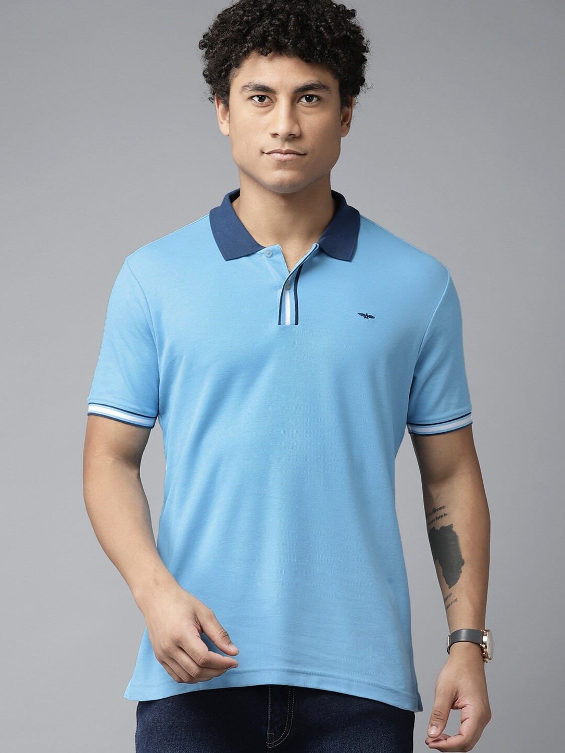 Image of PARK AVENUE Men Solid Polo Neck Cotton Blend Blue T-Shirt