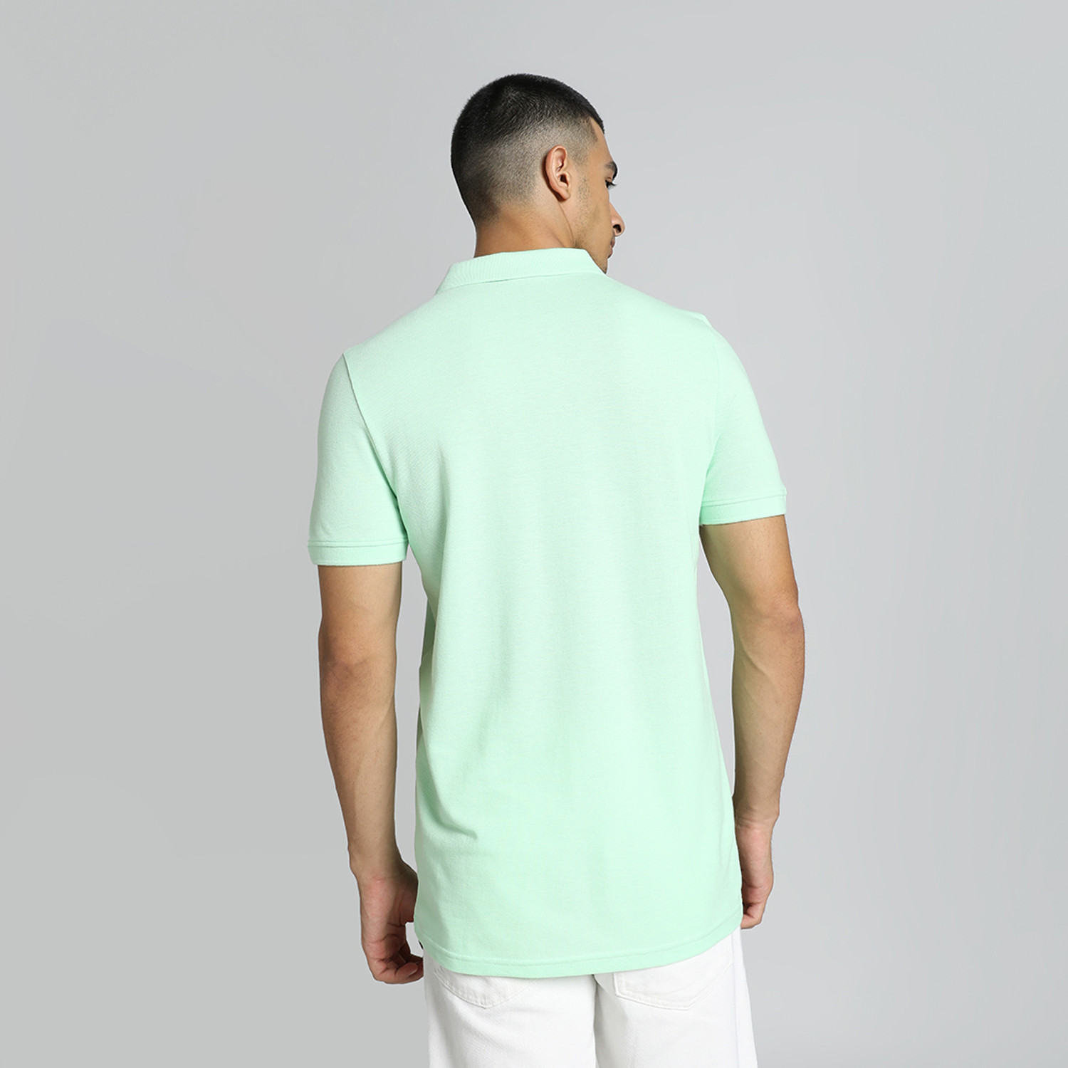 Image of PUMA Solid Men Polo Neck Green T-Shirt