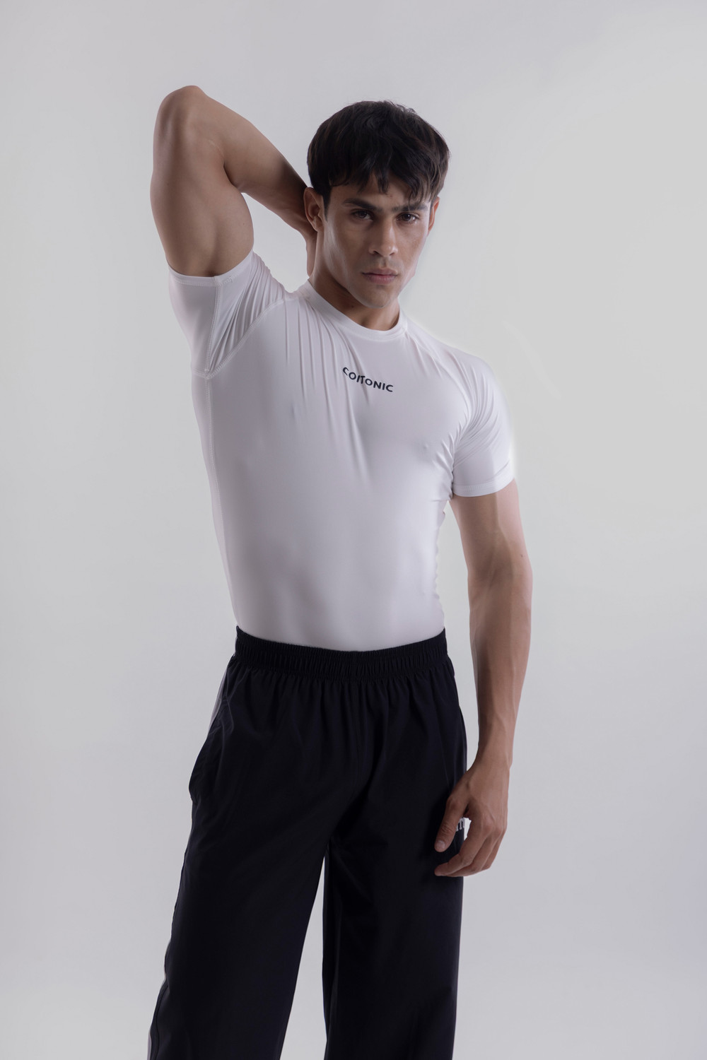Image of COITONIC Solid Men Round Neck White T-Shirt