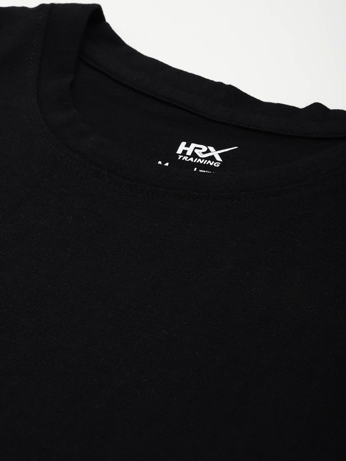 Image of HRX by Hrithik Roshan Solid Men Round Neck Black T-Shirt