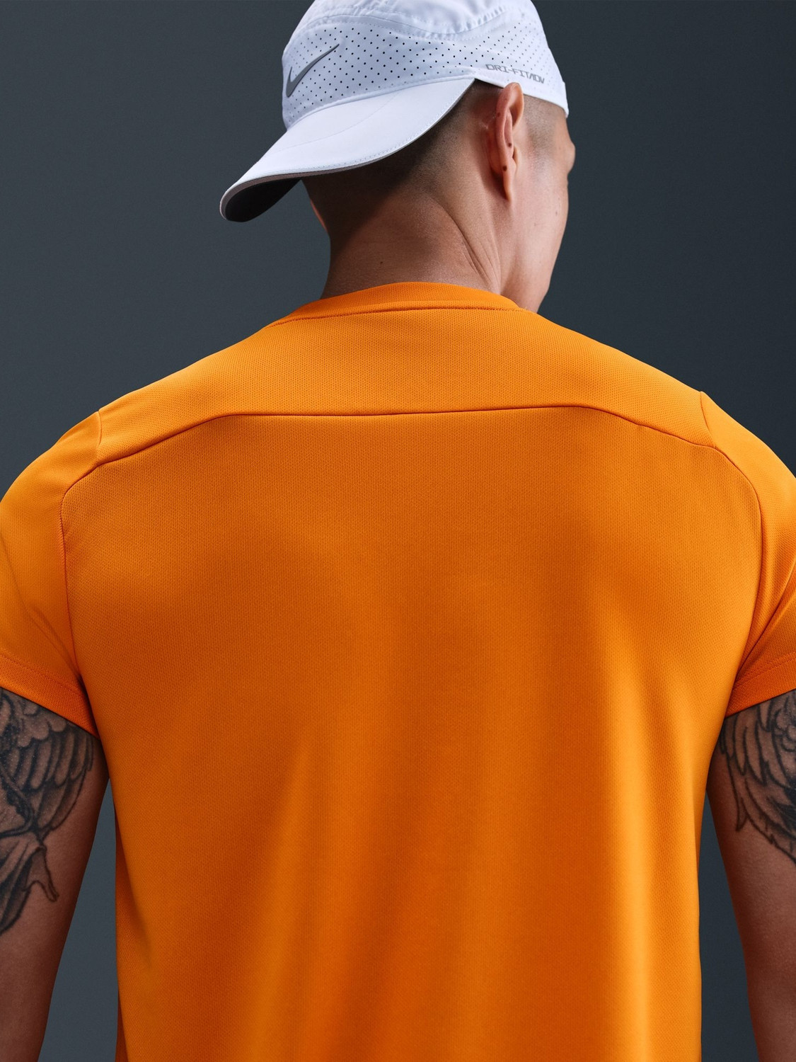 Image of NIKE Solid Men Round Neck Orange T-Shirt