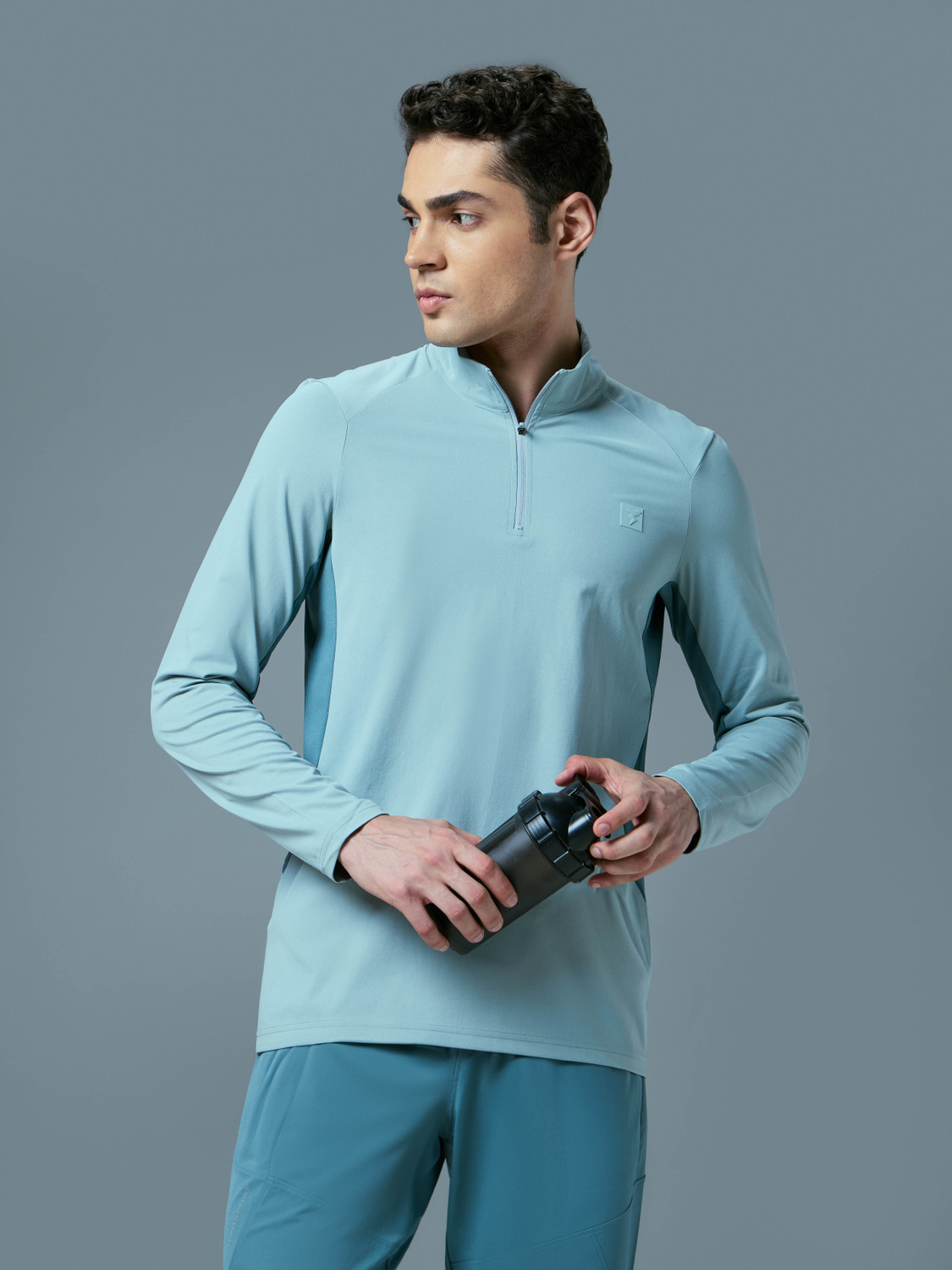 Image of TECHNOSPORT Sporty Men High Neck Light Blue T-Shirt