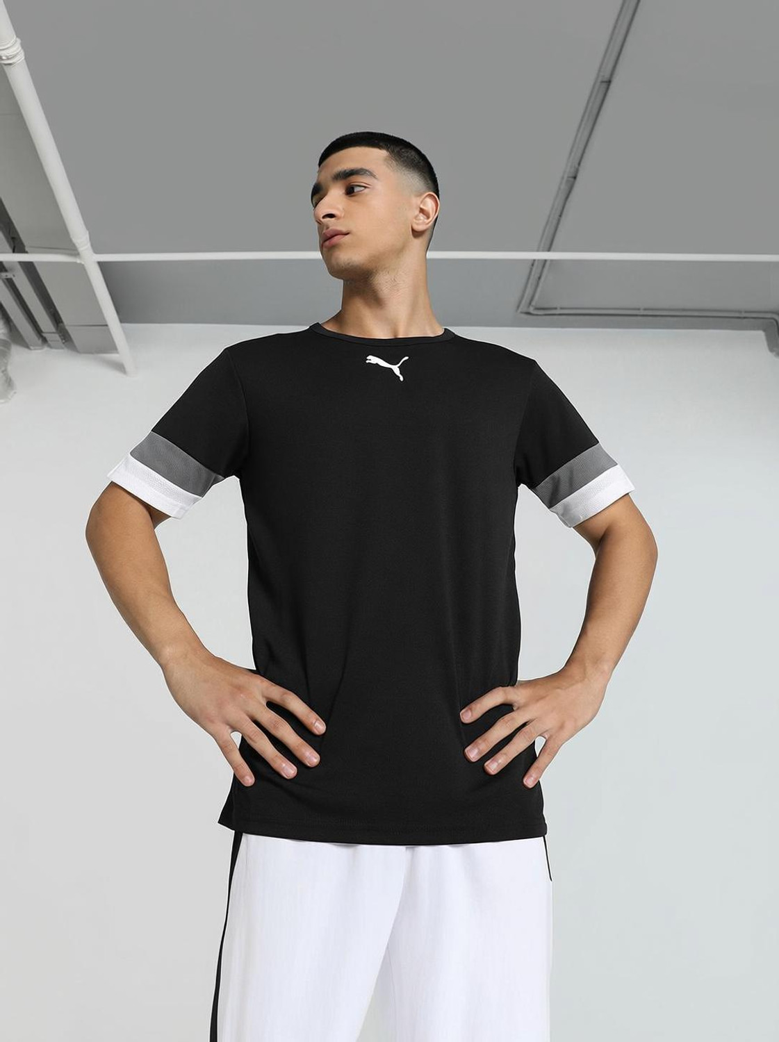 Image of PUMA Solid Men Crew Neck Black T-Shirt