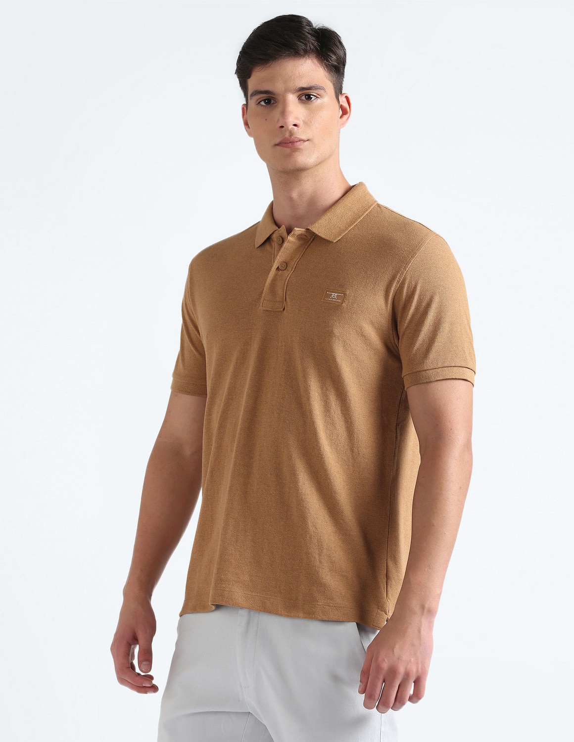 Image of FLYING MACHINE Solid Men Polo Neck Brown T-Shirt