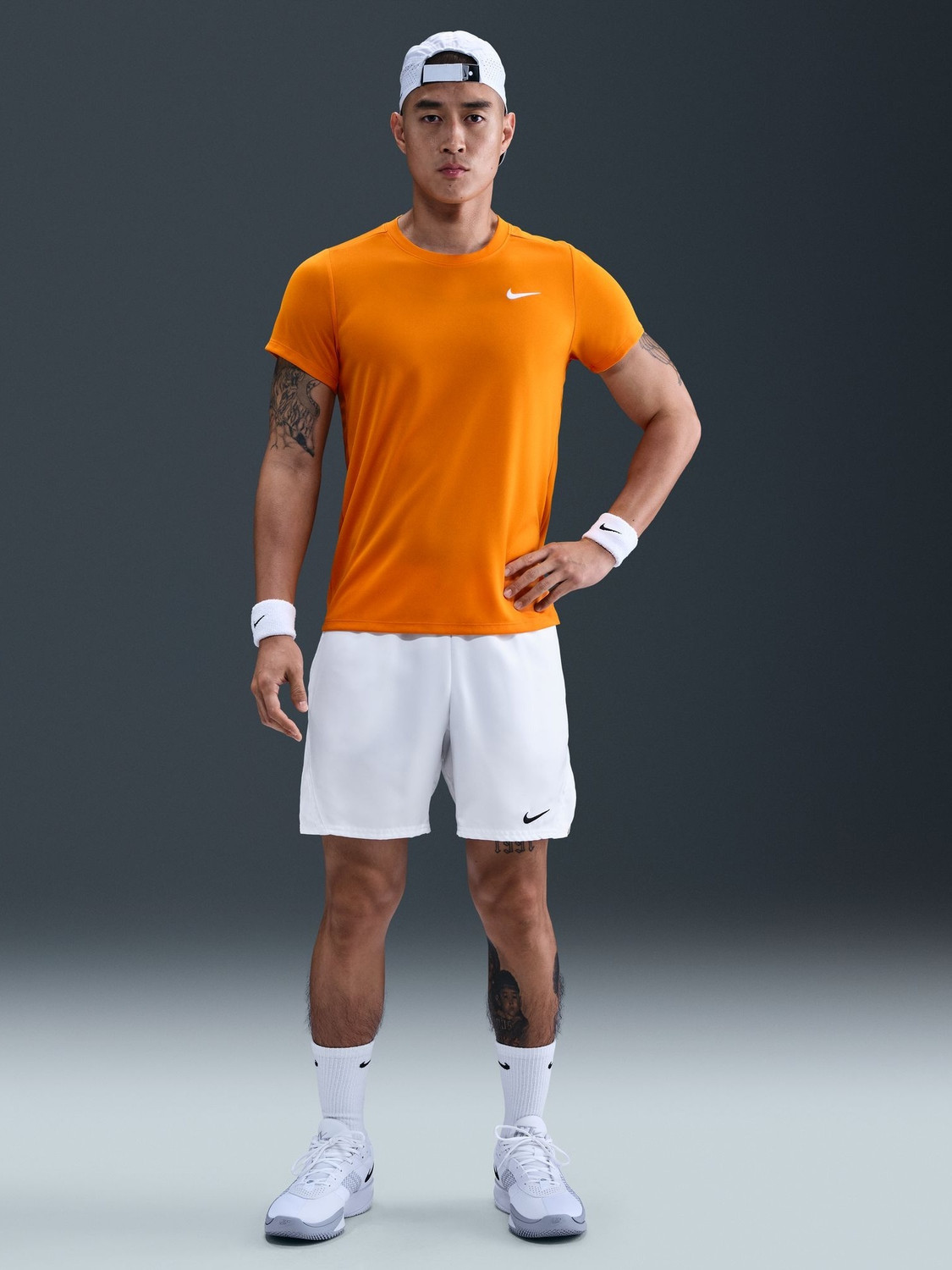 Image of NIKE Solid Men Round Neck Orange T-Shirt