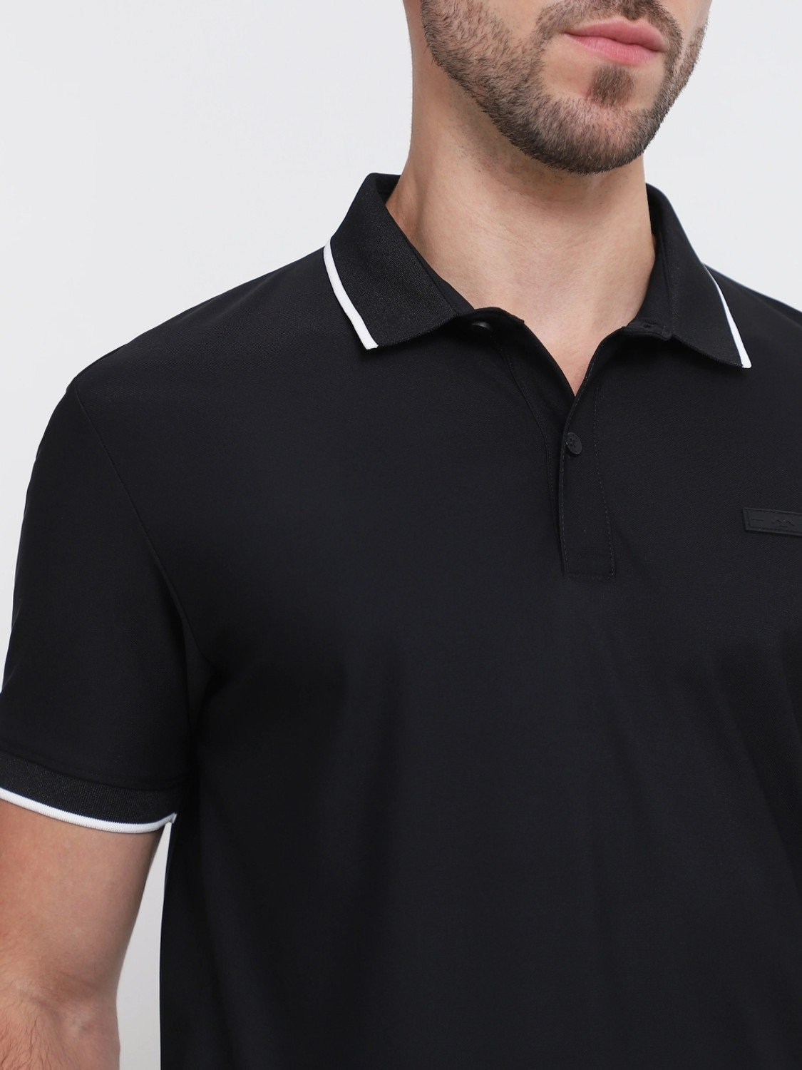 Image of MUFTI Self Design Men Polo Neck Black T-Shirt