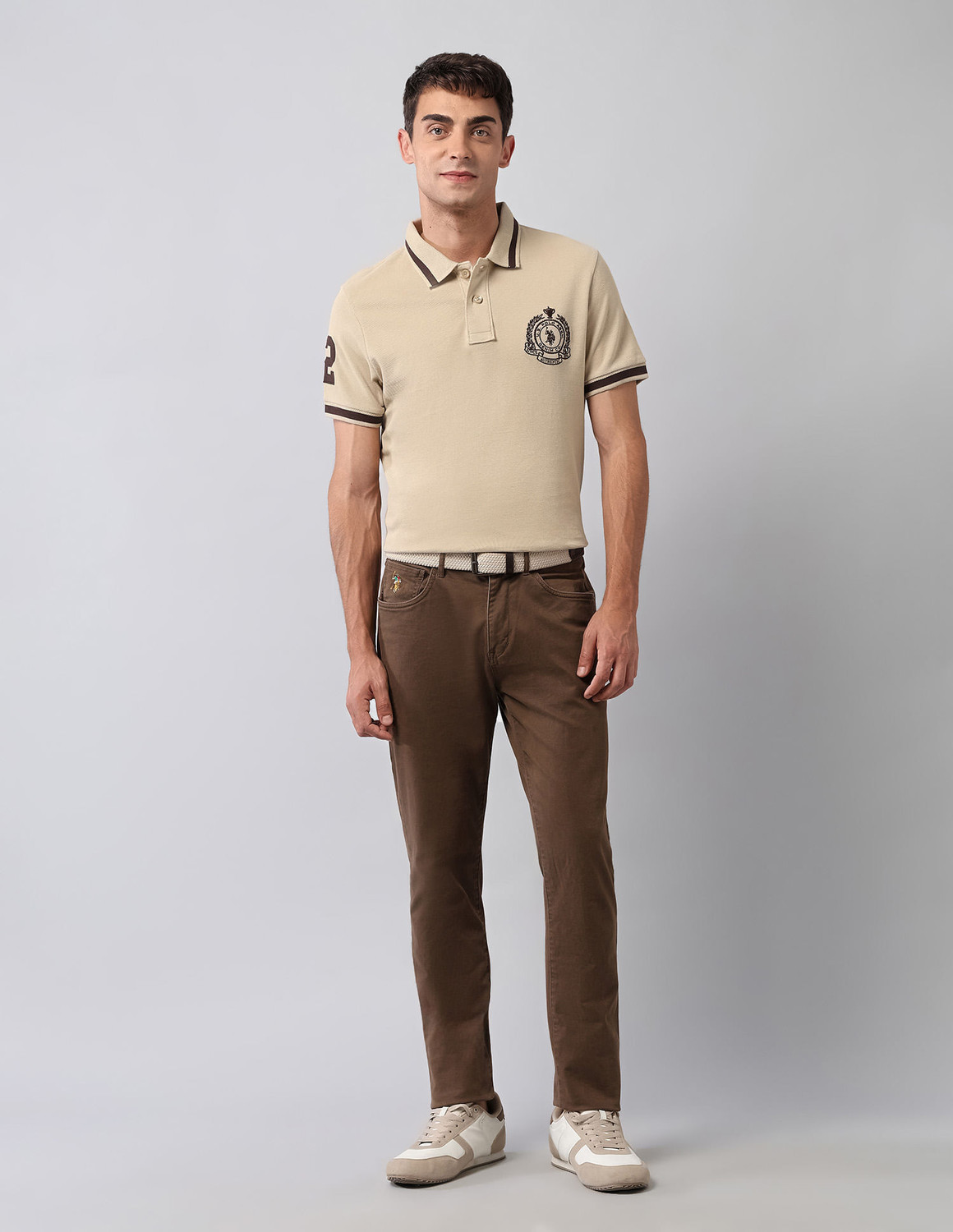 Image of U.S. Polo Assn. Denim Co. Solid Men Polo Neck Beige T-Shirt