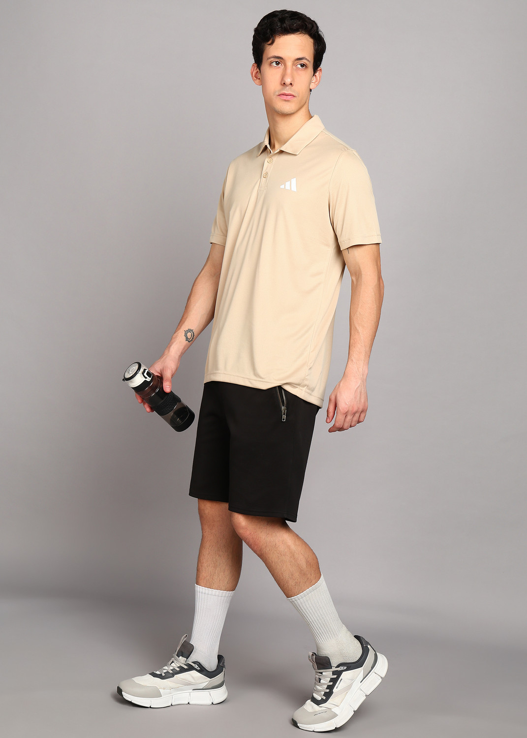 Image of ADIDAS Men Self Design Polo Neck Polyester Beige T-Shirt
