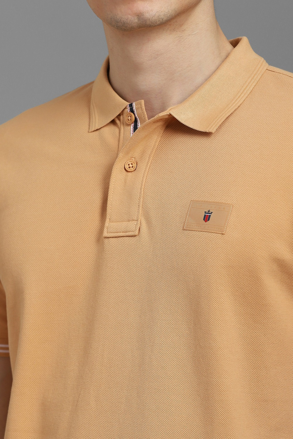 Image of LOUIS PHILIPPE Solid Men Polo Neck Beige T-Shirt