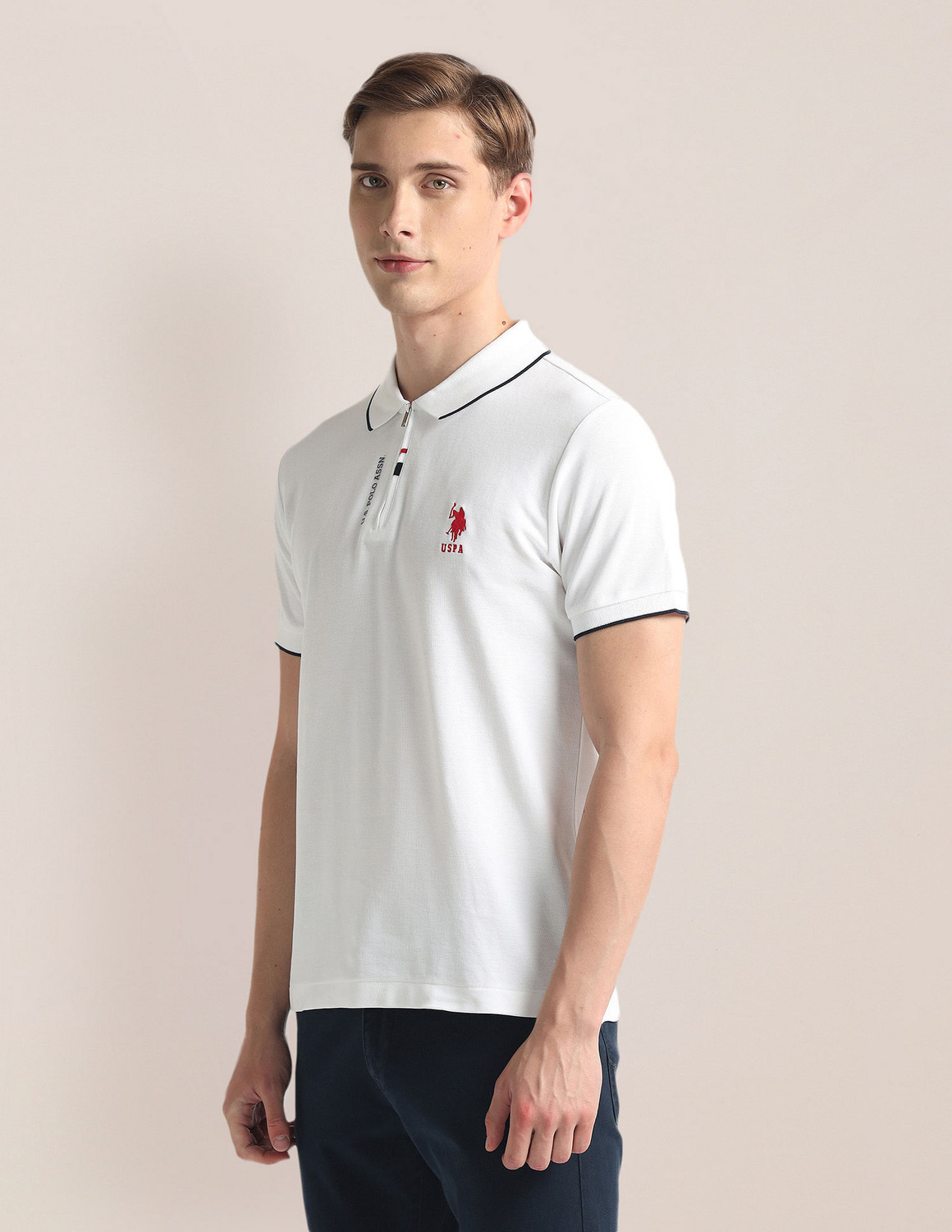Image of U.S. POLO ASSN. Solid Men Polo Neck White T-Shirt