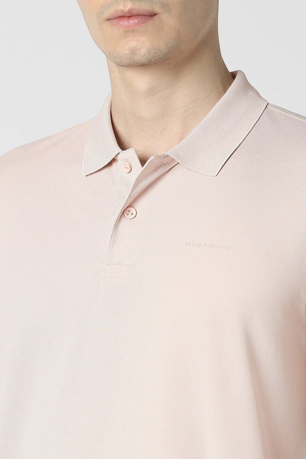 Image of PETER ENGLAND Men Solid Polo Neck Polycotton Pink T-Shirt