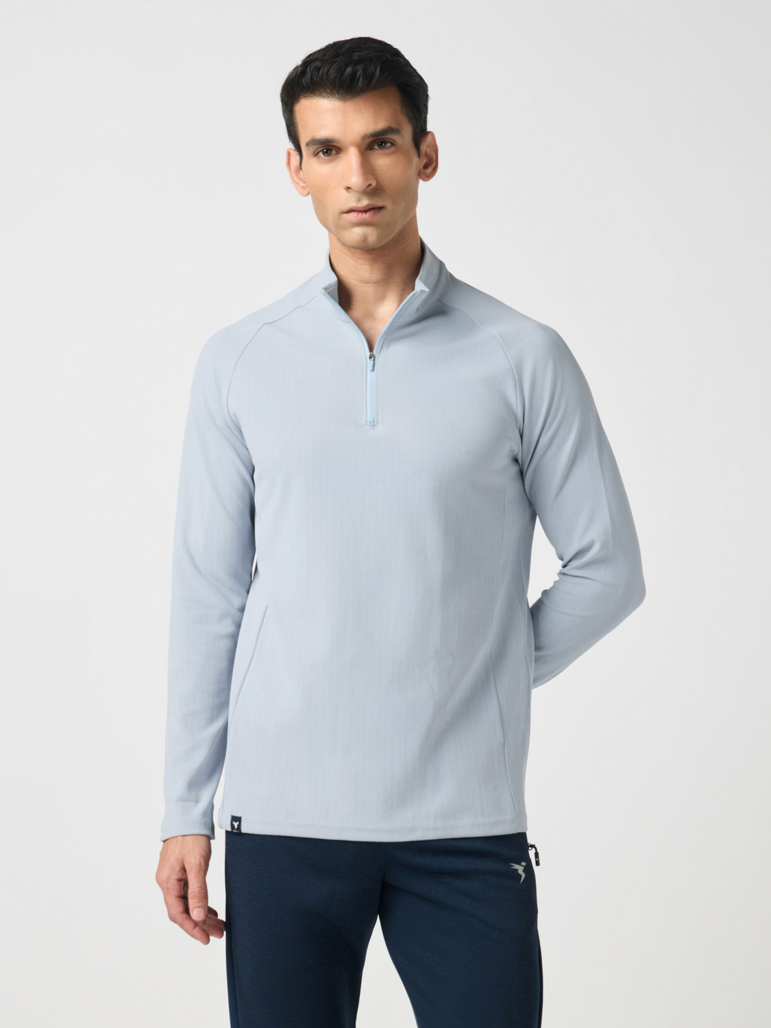 Image of TECHNOSPORT Solid Men Zip Neck Light Blue T-Shirt