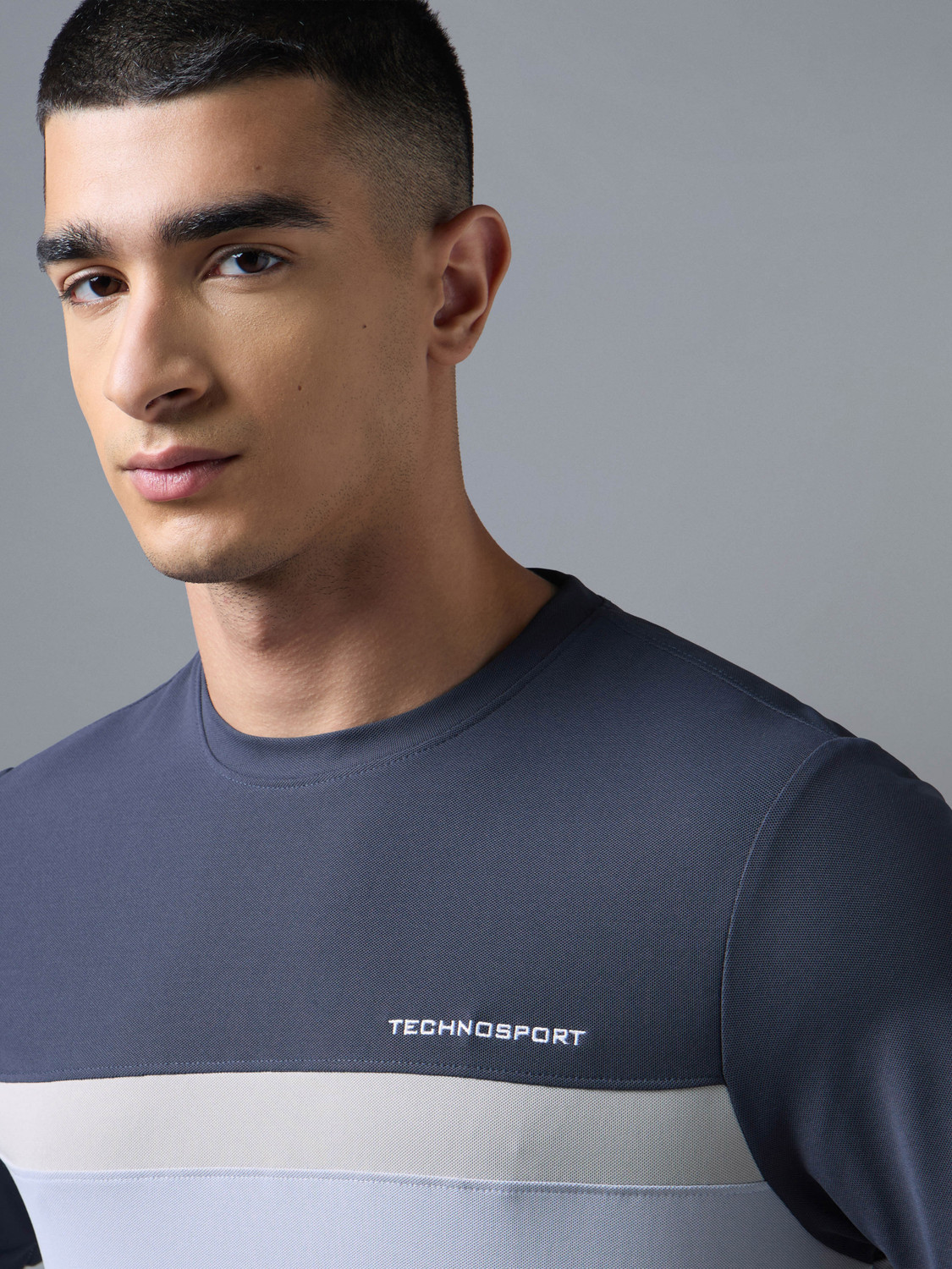 Image of TECHNOSPORT Men Colorblock Round Neck Polyester Blue T-Shirt