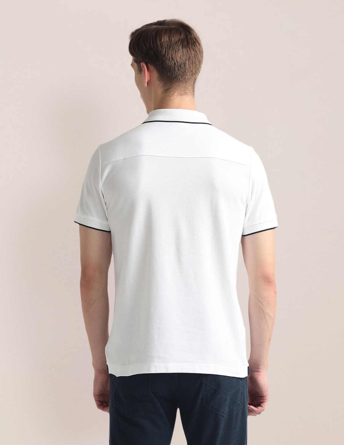Image of U.S. POLO ASSN. Solid Men Polo Neck White T-Shirt