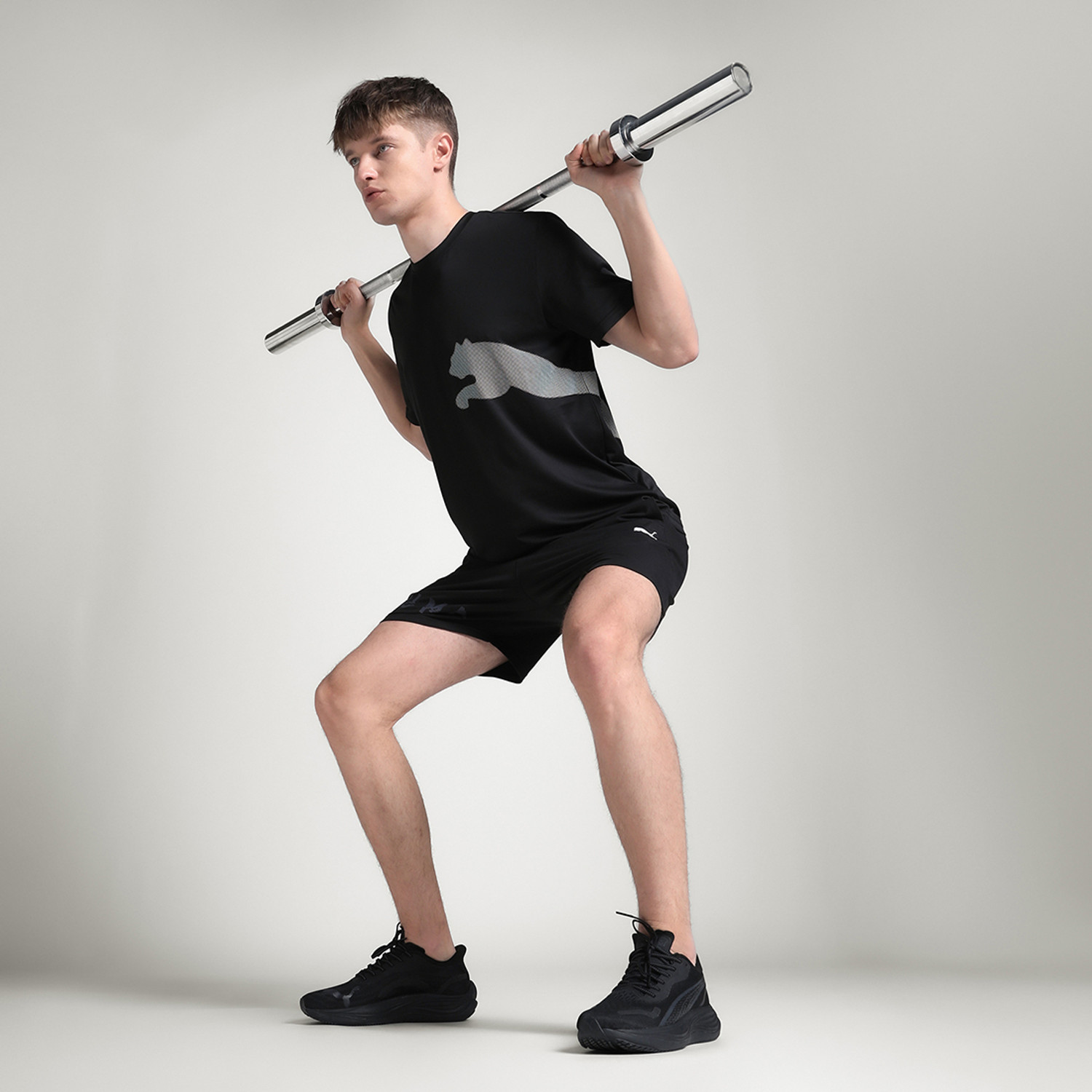 Image of PUMA Solid Men Crew Neck Black T-Shirt