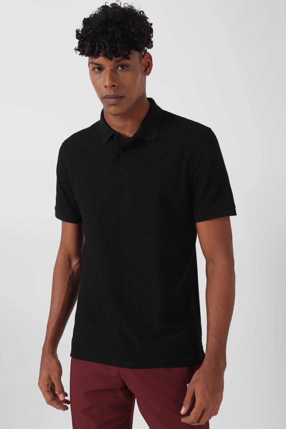 REEBOK Men Solid Polo Neck Cotton Blend Black T-Shirt