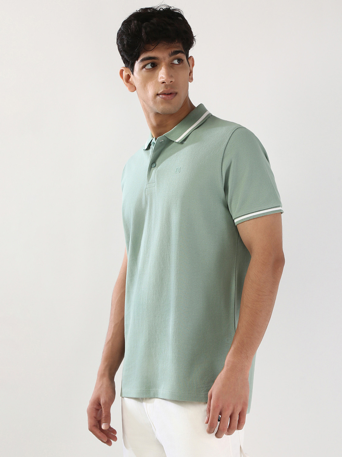Image of Urbano Fashion Solid Men Polo Neck Green T-Shirt