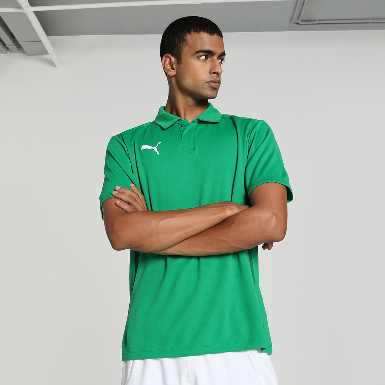 Image of PUMA Solid Men Polo Neck Green T-Shirt