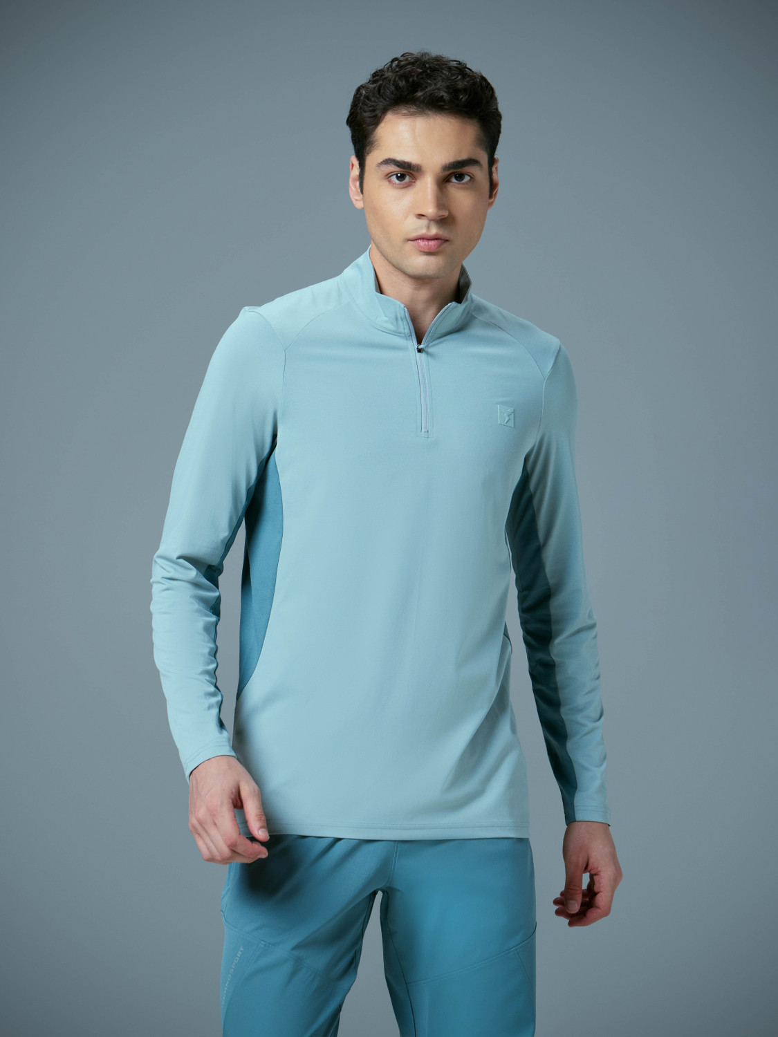 Image of TECHNOSPORT Sporty Men High Neck Light Blue T-Shirt