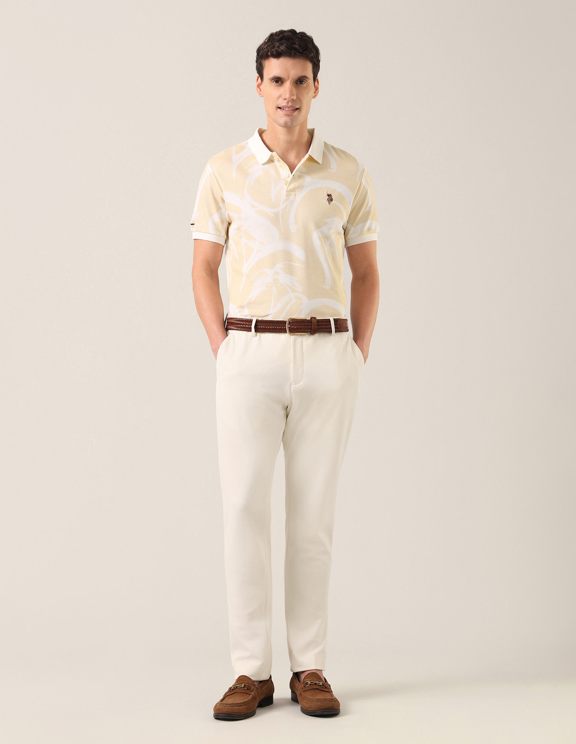 Image of U.S. Polo Assn. Denim Co. Men Printed Polo Neck Pure Cotton Beige T-Shirt