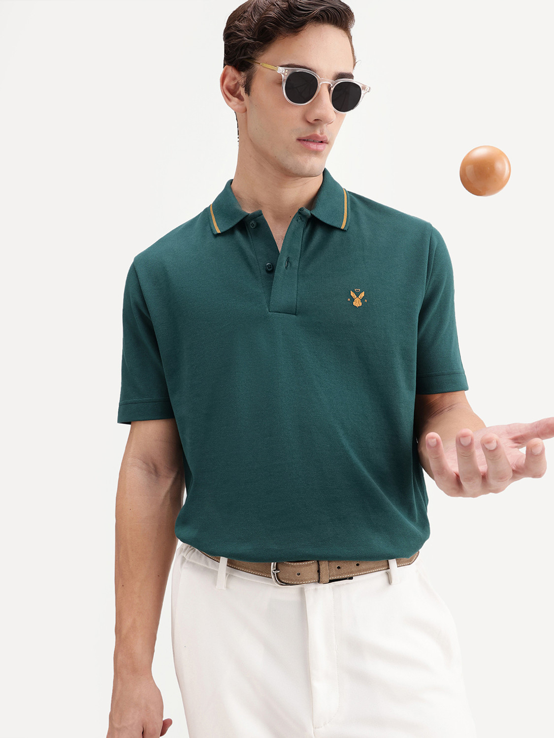 Image of RARE RABBIT Solid Men Polo Neck Green T-Shirt
