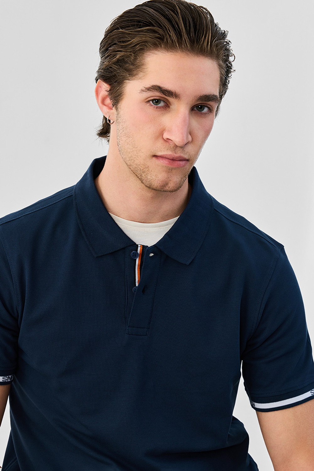 Image of Snitch Solid Men Polo Neck Navy Blue T-Shirt