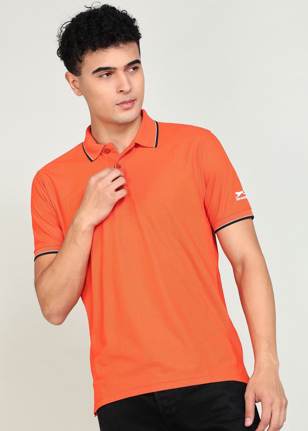 Image of Shiv Naresh Solid Men Polo Neck Orange T-Shirt