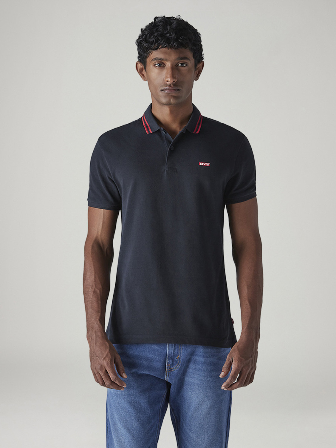 Image of LEVI'S Solid Men Polo Neck Dark Blue T-Shirt