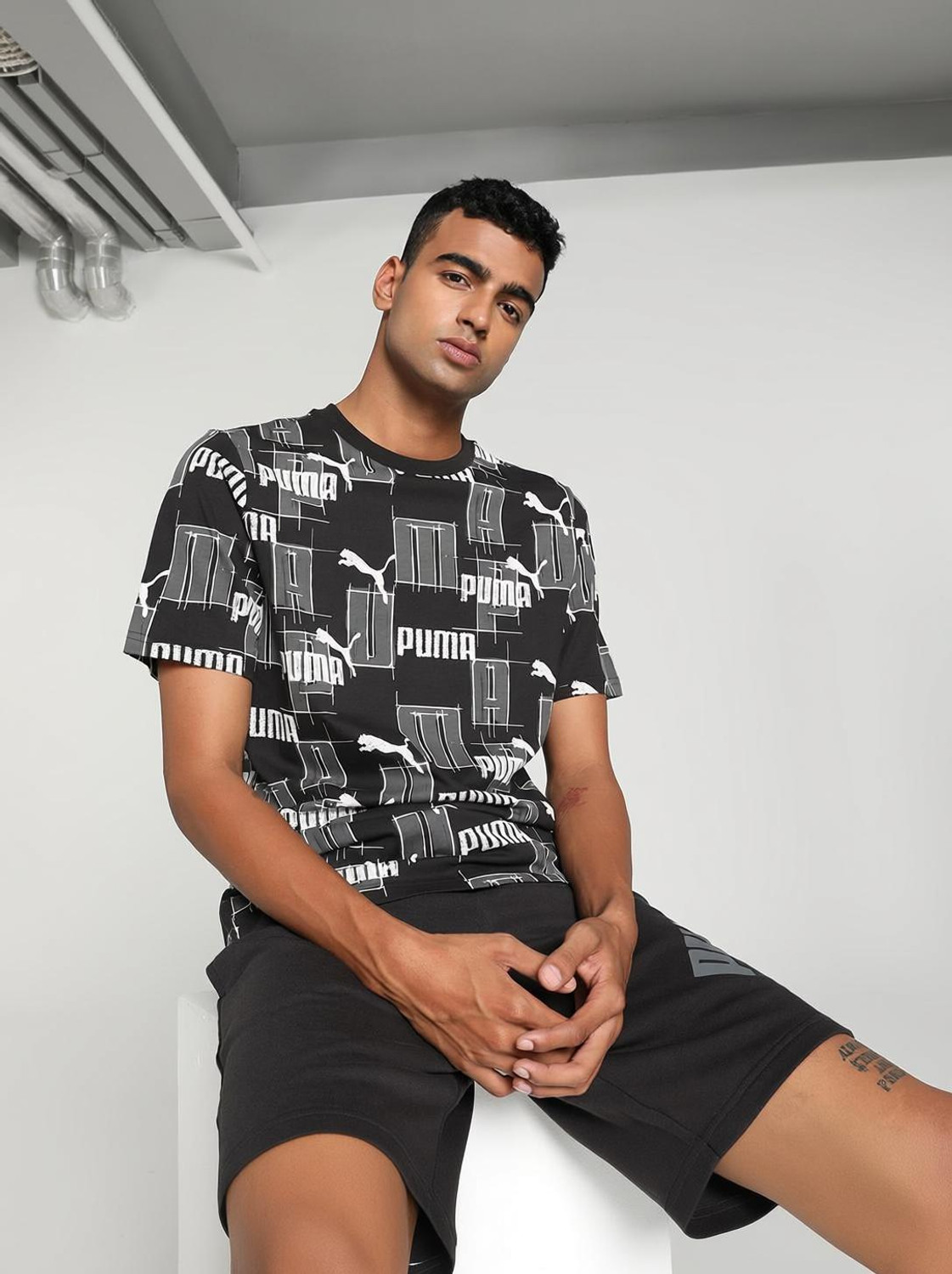 Image of PUMA Printed Men Crew Neck Black T-Shirt