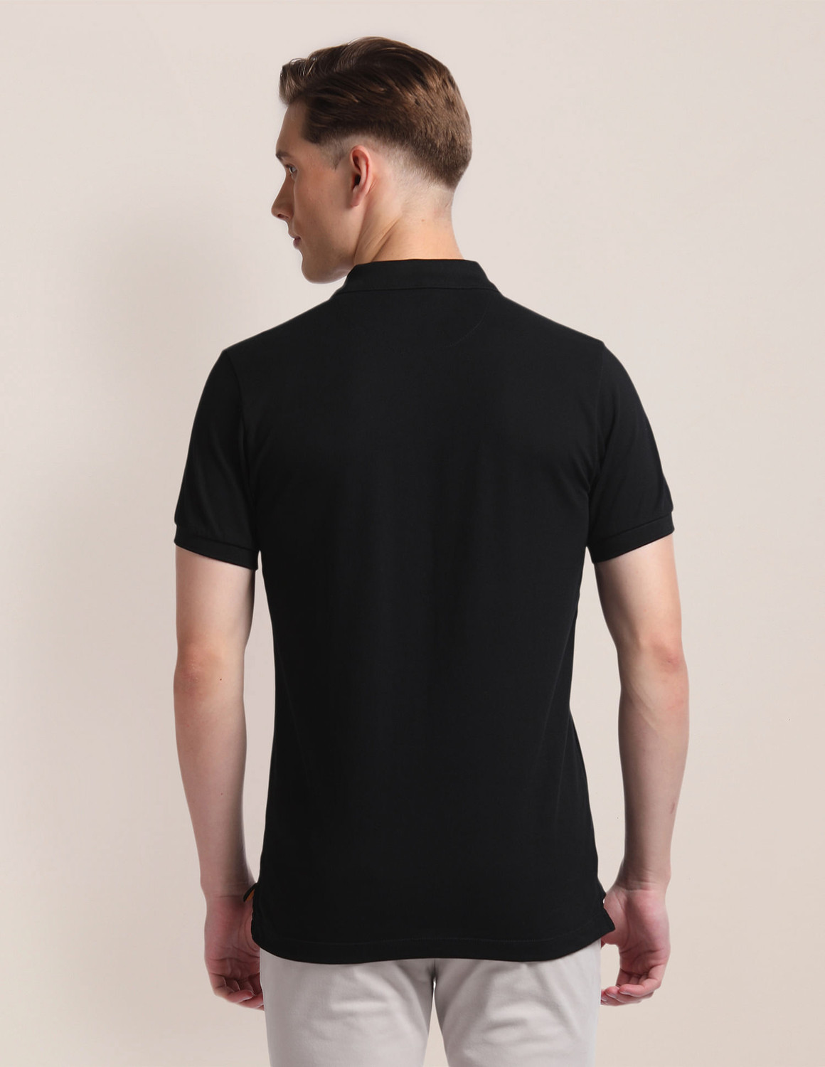 Image of U.S. POLO ASSN. Solid Men Polo Neck Black T-Shirt