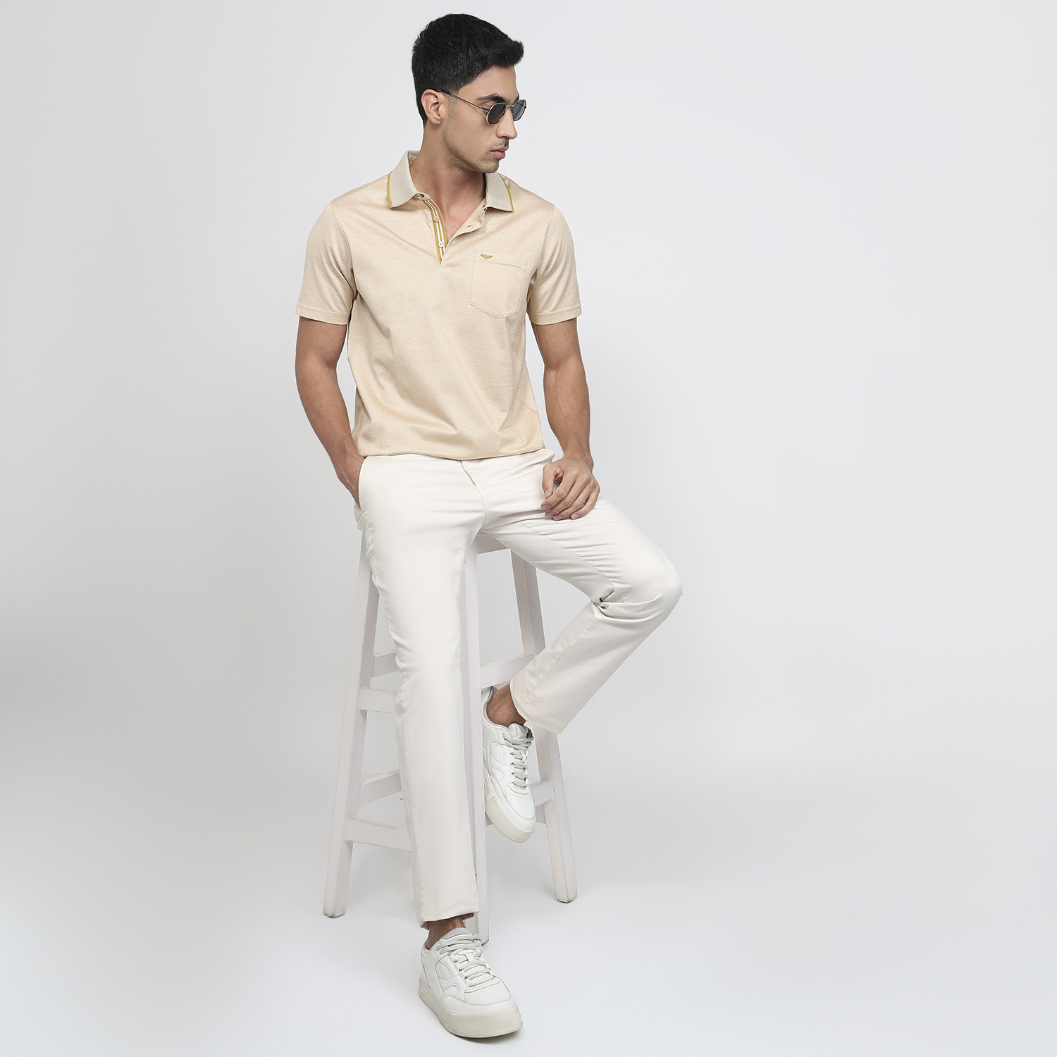 Image of PARK AVENUE Men Solid Polo Neck Pure Cotton Beige T-Shirt