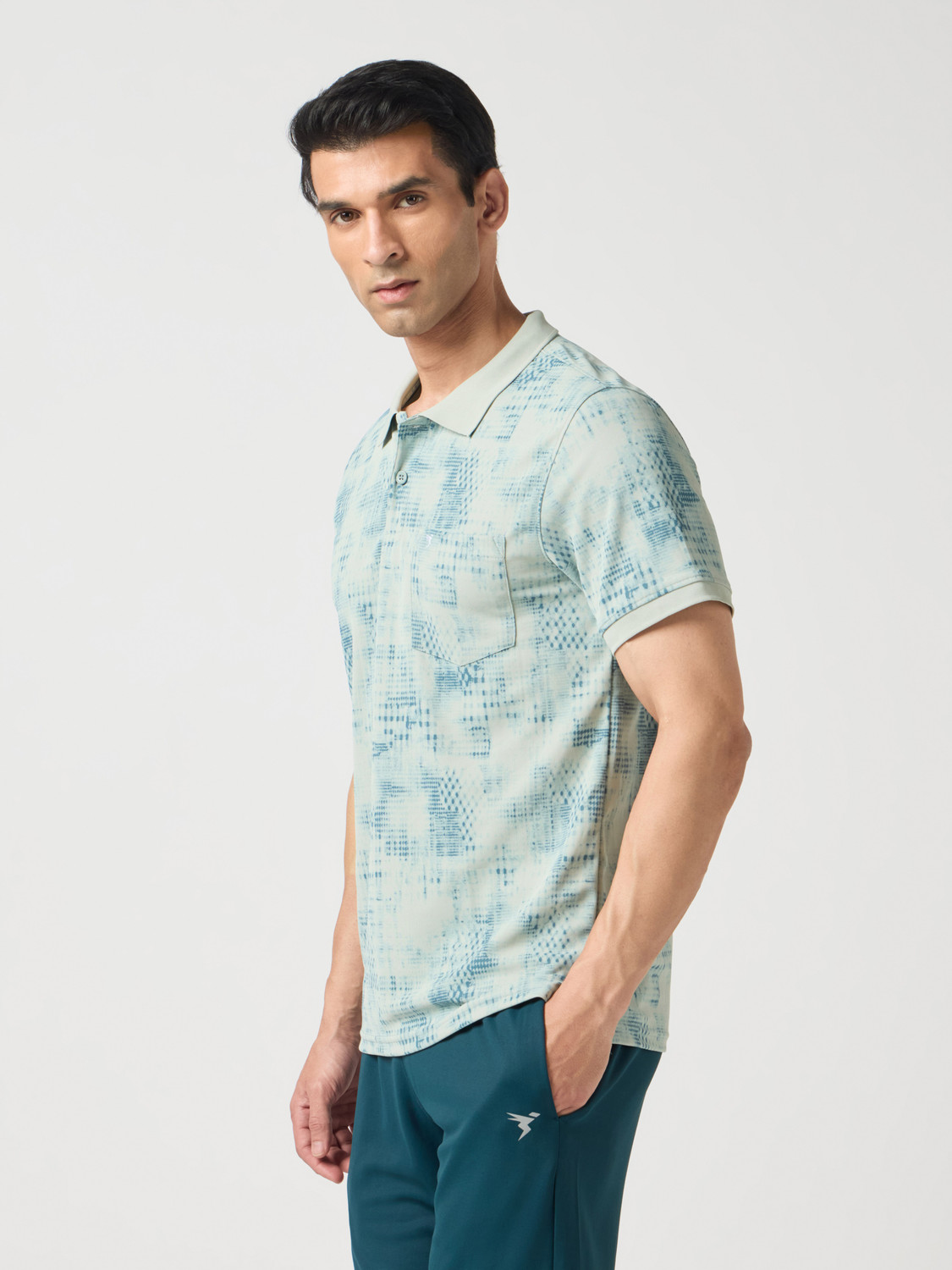 Image of TECHNOSPORT Self Design Men Polo Neck Light Green T-Shirt