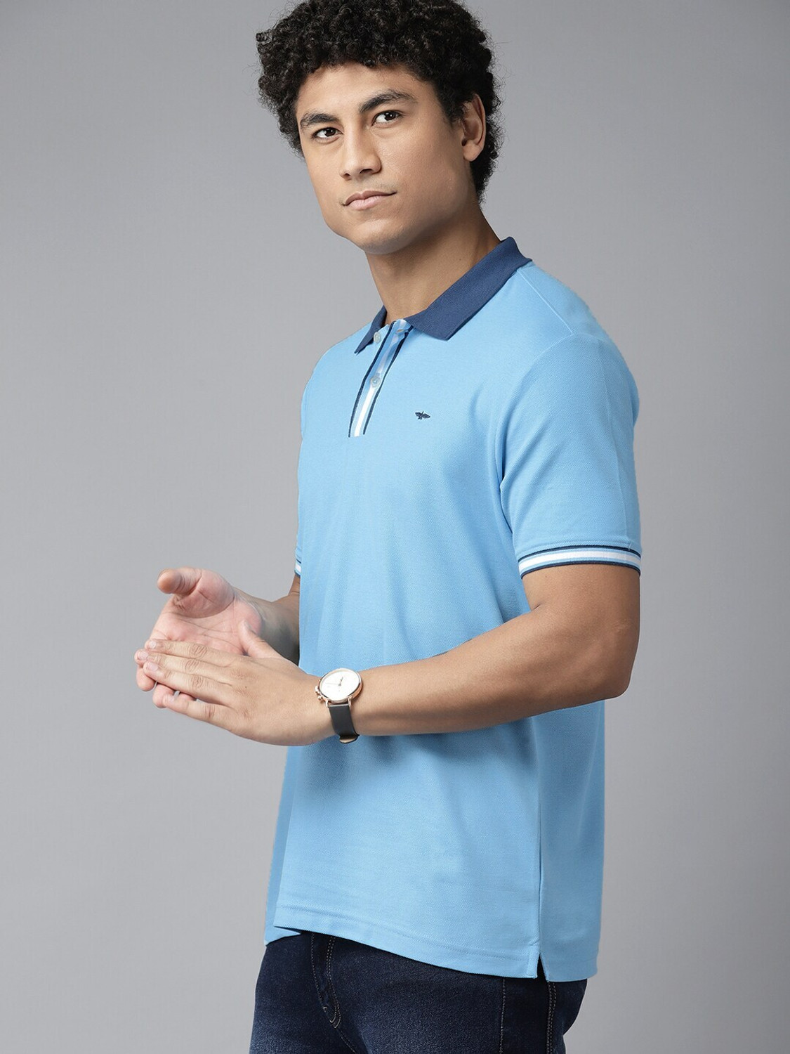 Image of PARK AVENUE Men Solid Polo Neck Cotton Blend Blue T-Shirt