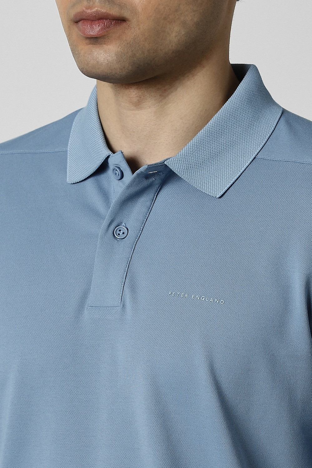 Image of PETER ENGLAND Solid Men Polo Neck Light Blue T-Shirt