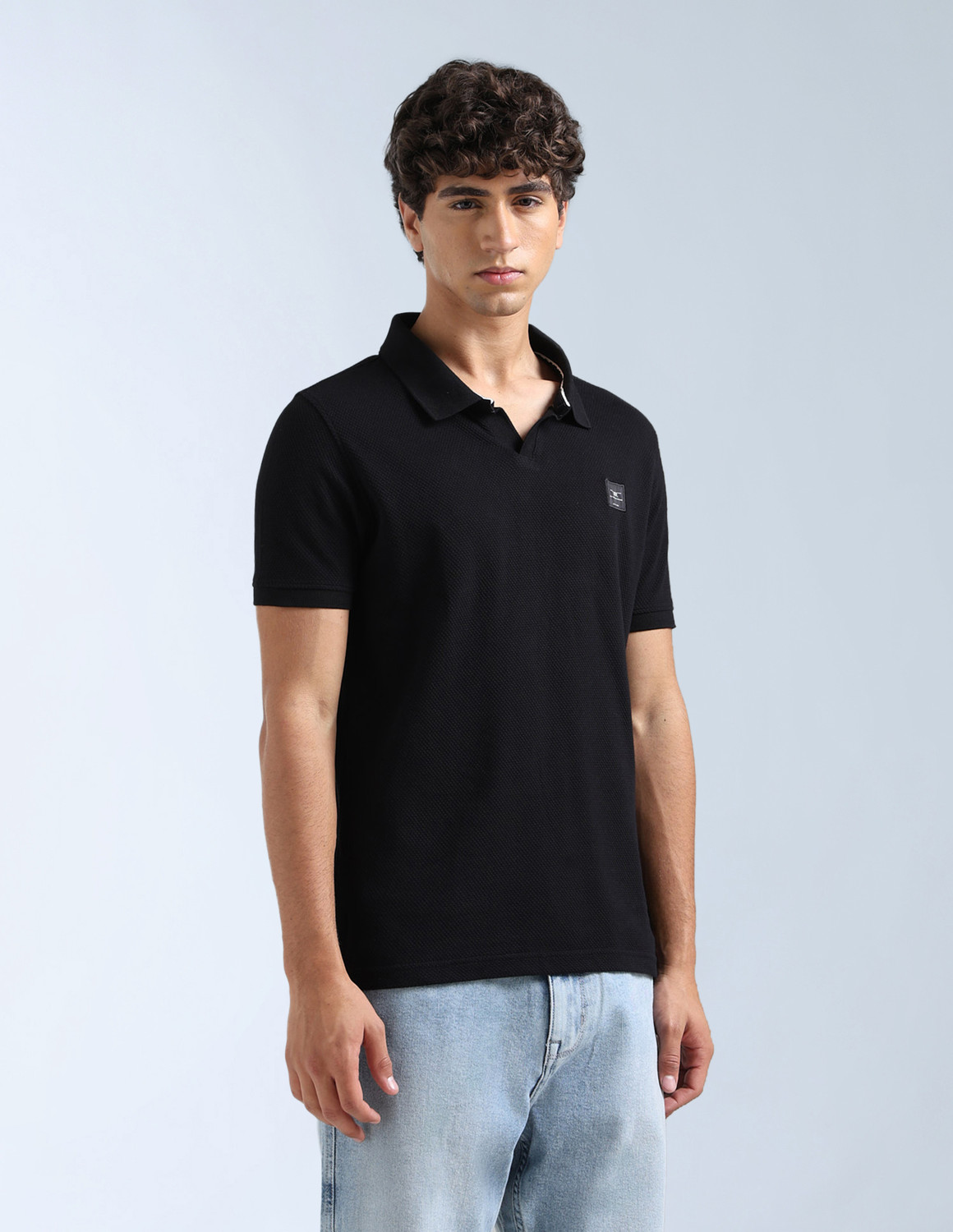 Image of FLYING MACHINE Self Design Men Polo Neck Black T-Shirt