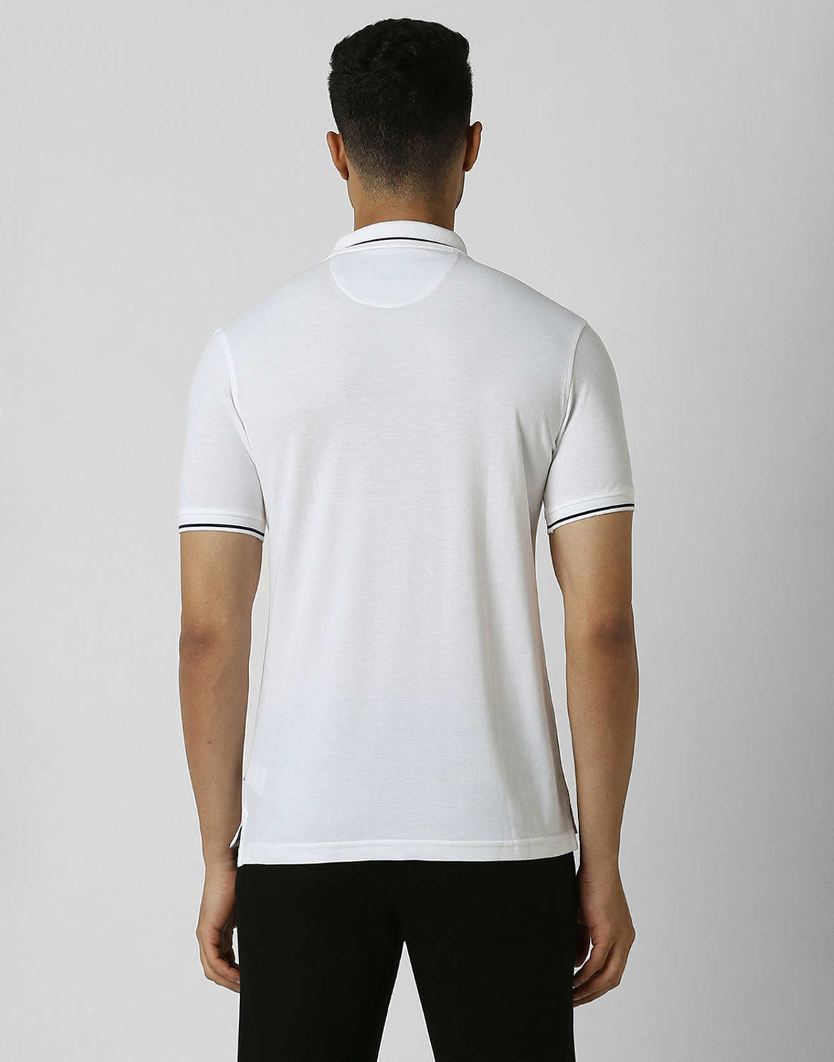 Image of VAN HEUSEN Solid Men Polo Neck White T-Shirt