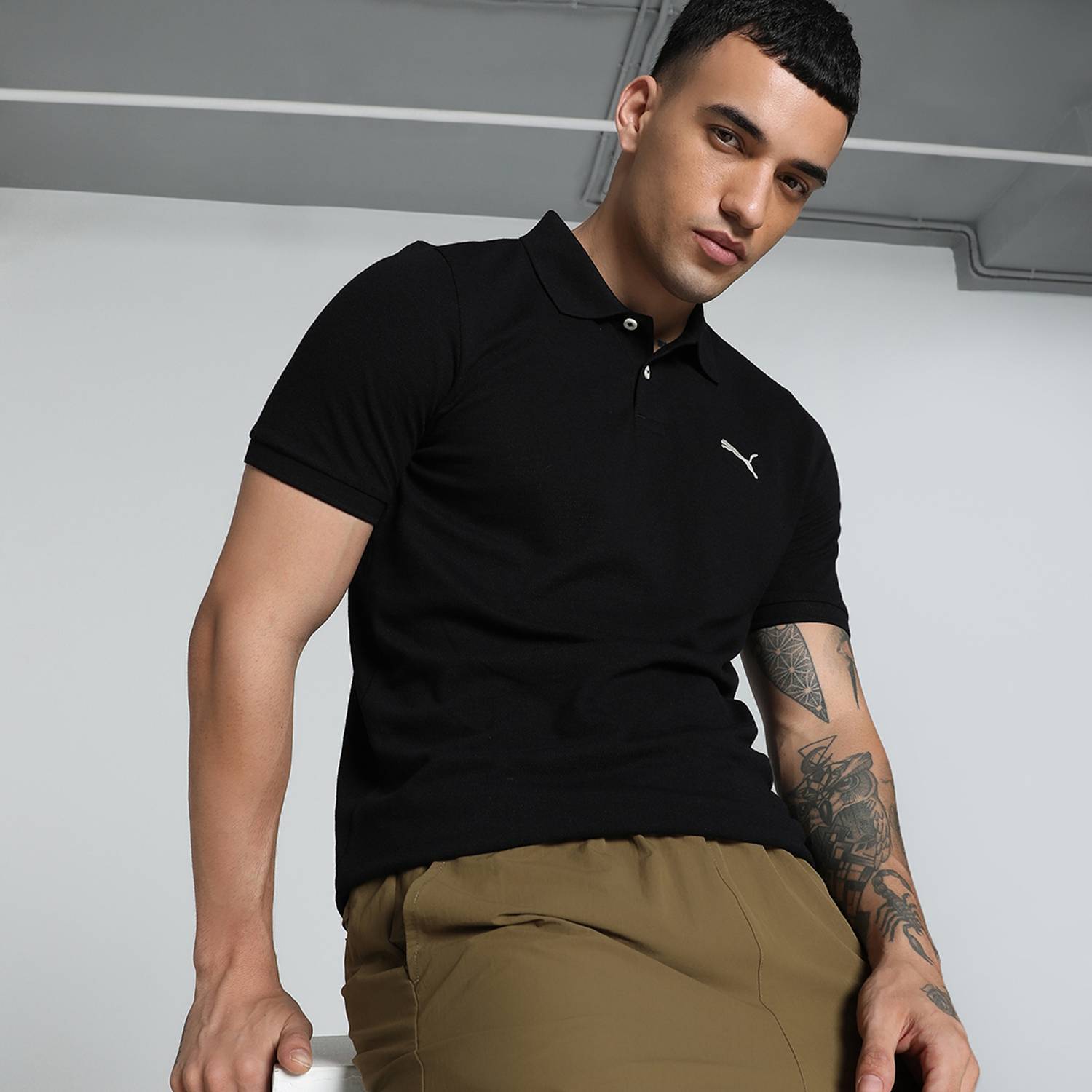PUMA Men Solid Polo Neck Pure Cotton Black T-Shirt